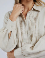 the toulouse blouse by foxwood is a linen long sleeve shirt with pintuck details