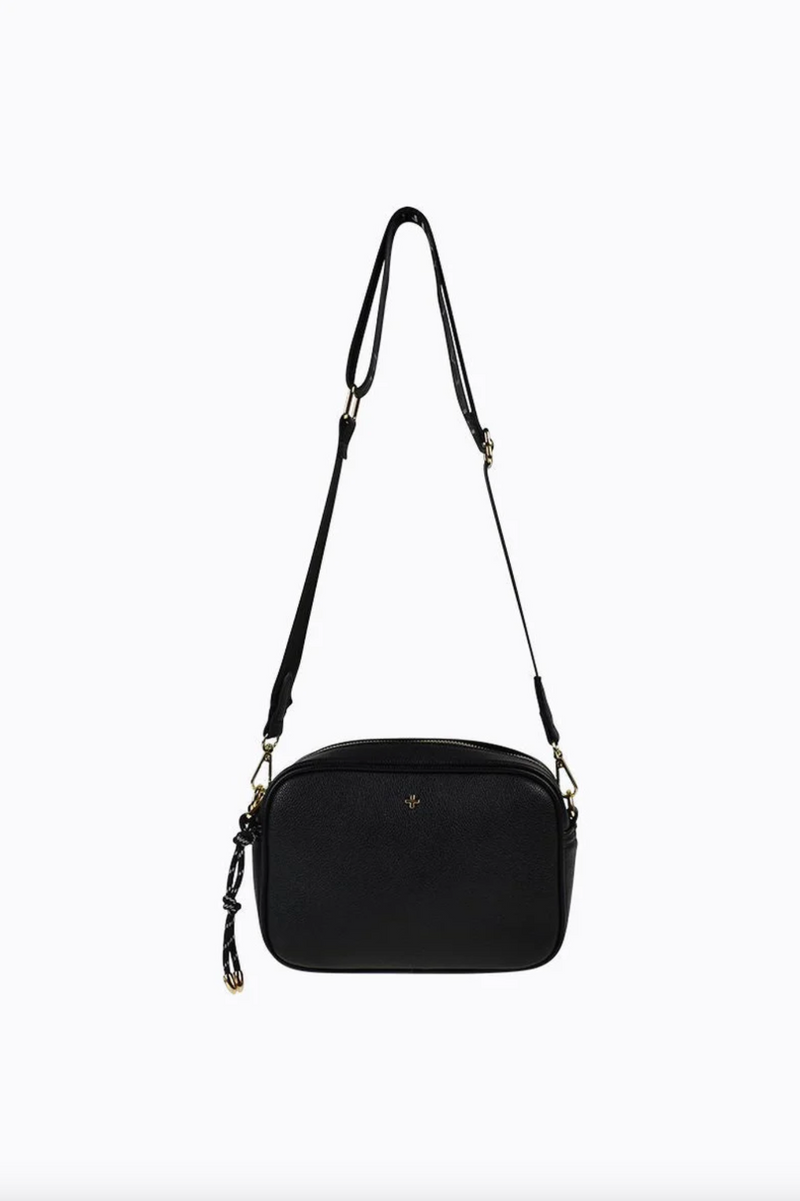 a black vegan leather crossbody bag by peta and jain