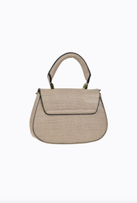 amalie crossbody bag by peta and jain is a vegan leather bag with a top handle in nude croc