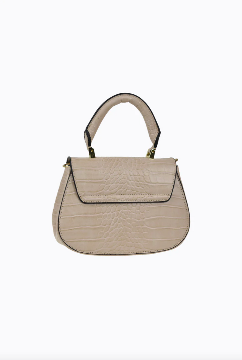 amalie crossbody bag by peta and jain is a vegan leather bag with a top handle in nude croc