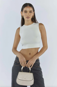 amalie crossbody bag by peta and jain is a vegan leather bag with a top handle in nude croc