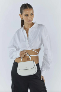 amalie crossbody bag by peta and jain is a vegan leather bag with a top handle in white pebble