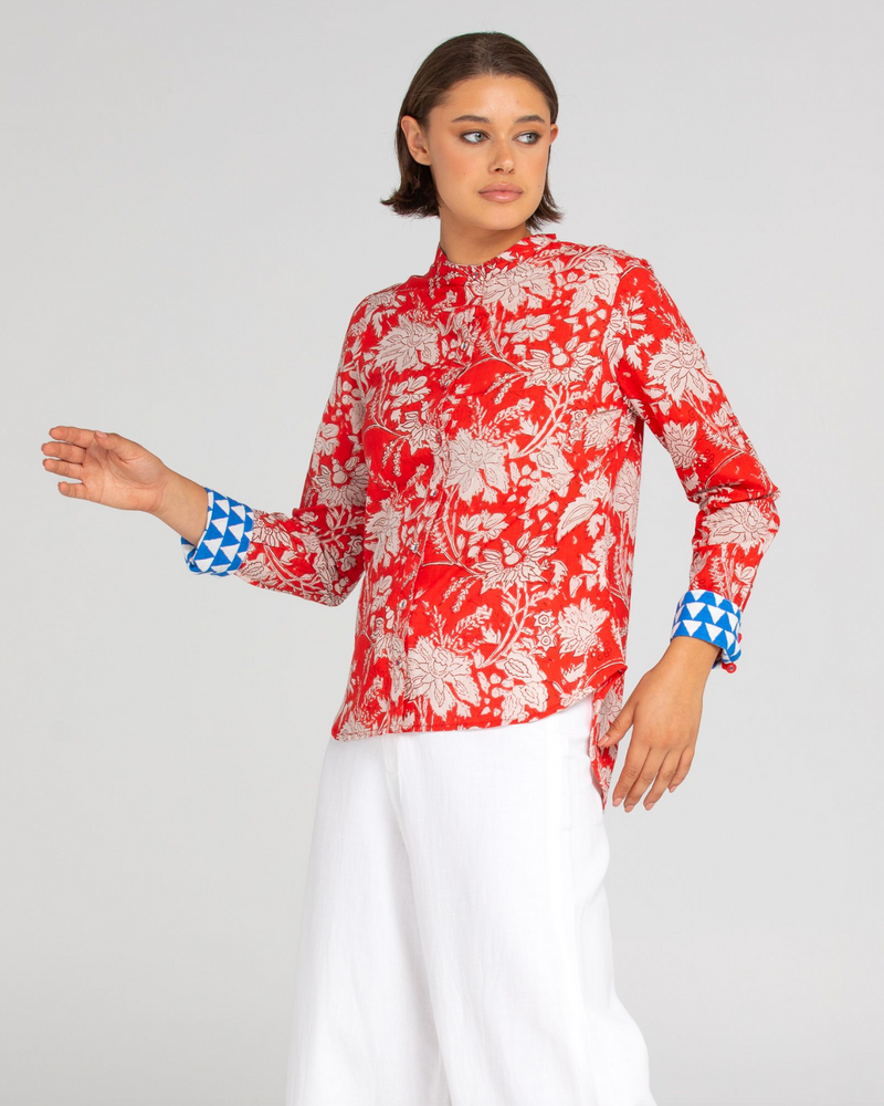 the cove shirt by boom shankar is a red paisley gypsy style top