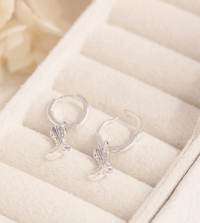 Sterling Silver Cow Girl Boot huggie earrings by midsummer star jewellery
