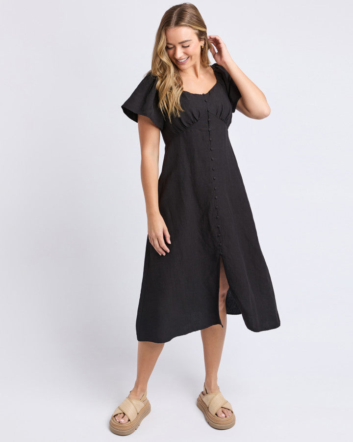 the juni dress by foxwood is a black linen blend midi length dress