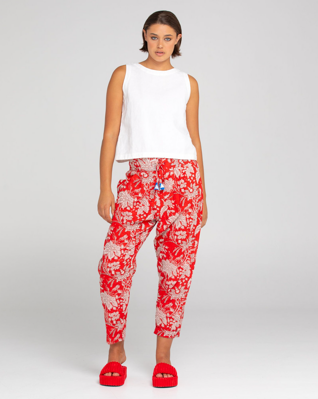 the kelsy pants by boom shankar are a red block print cotton pull on pant