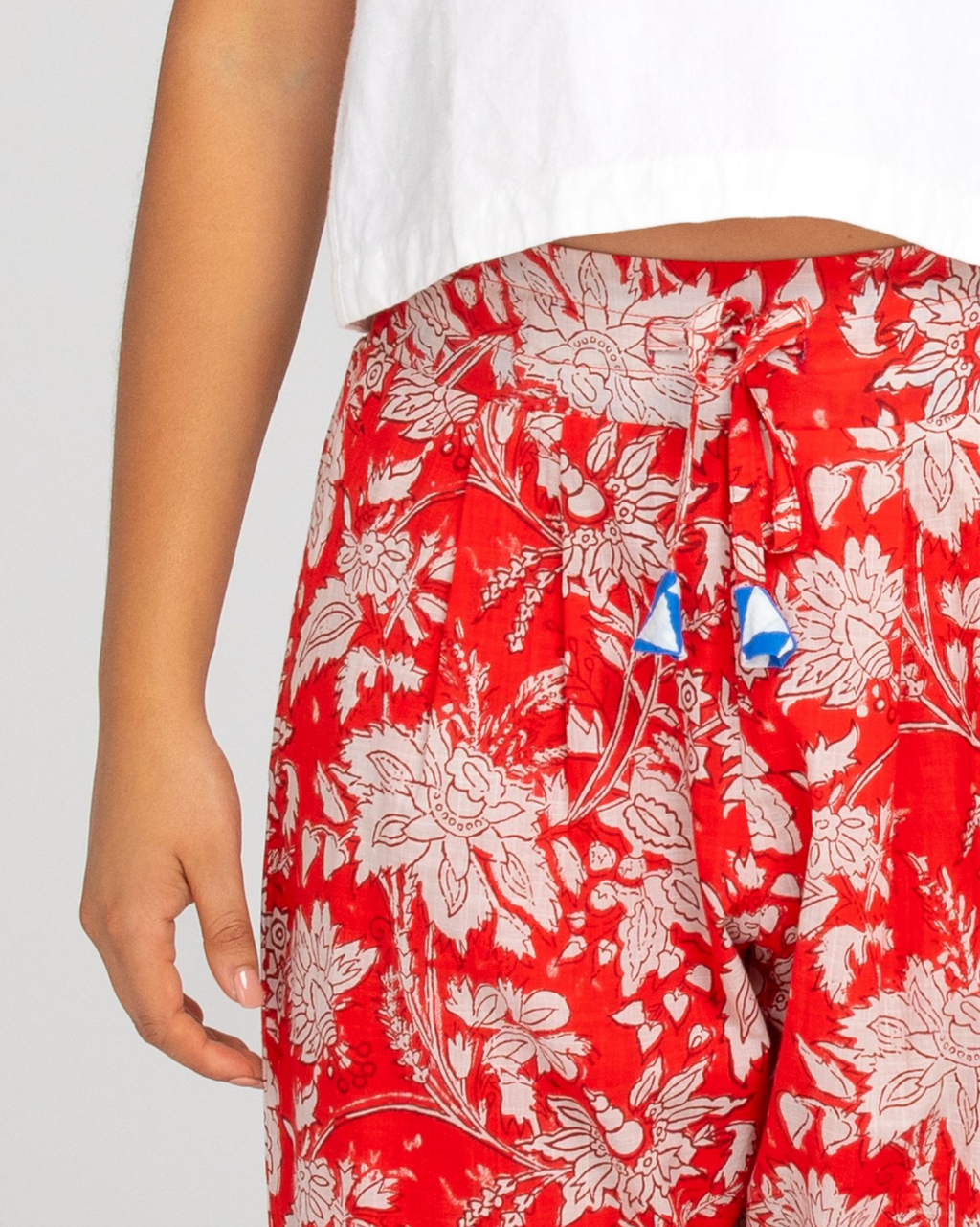 the kelsy pants by boom shankar are a red block print cotton pull on pant