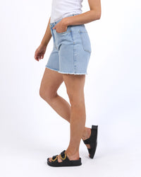 foxwood millie shorts are faded stretch denim with pockets and frayed hems