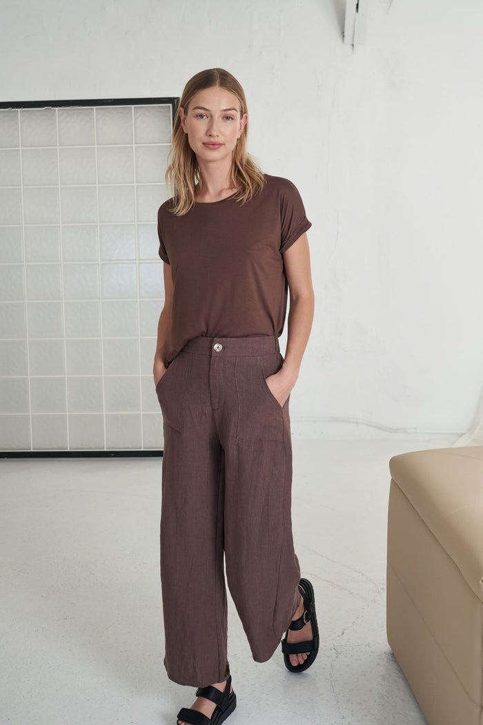 jude linen pants by little lies are wide leg pant in chocolate with zip and button front closure