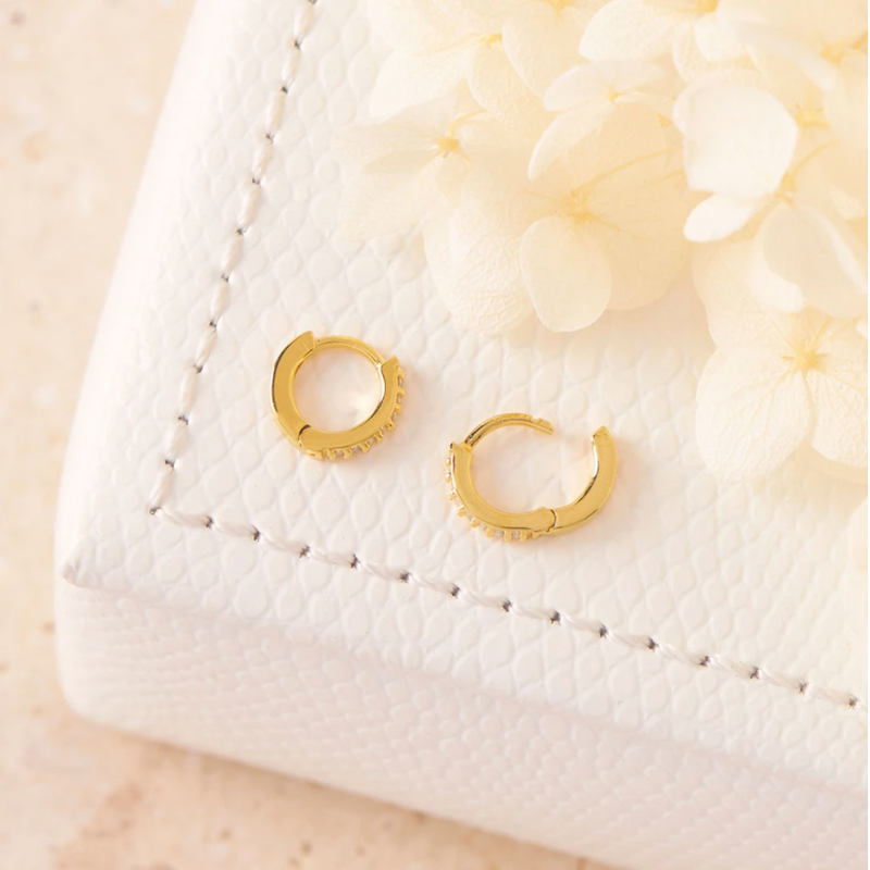 10mm sparkle micro 18 karat gold vermeil plated clear quartz huggie earring by midsummer star