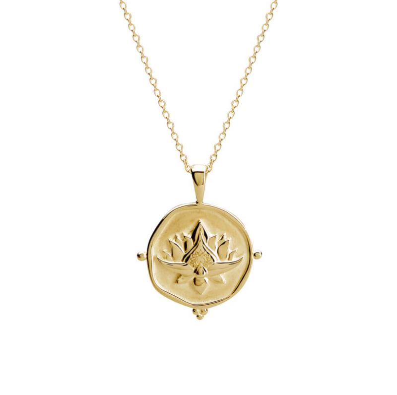 a 18 karat yellow gold plate necklace with a blooming lotus design pendant y murkani