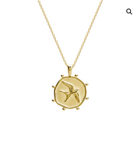 the freedom necklace by murkani is a 18 karat yellow gold plate fine chain with a swallow pendant