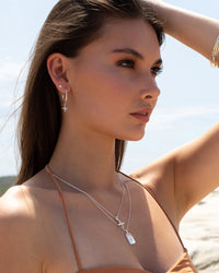 boho sterling silver hoop earrings by murkani with mother of pearl