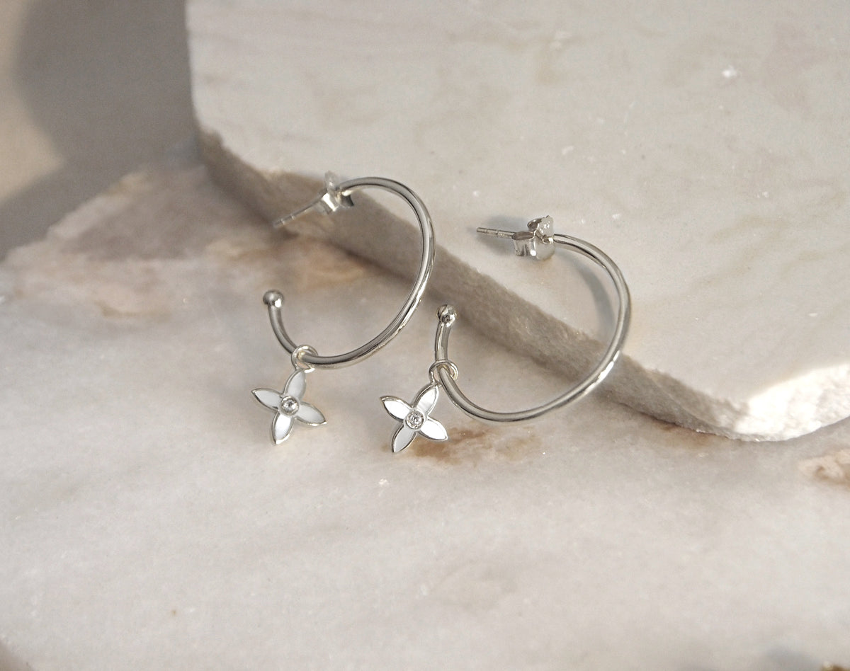 statement sterling silver desert flower hoop earrings by murkani with mother of pearl