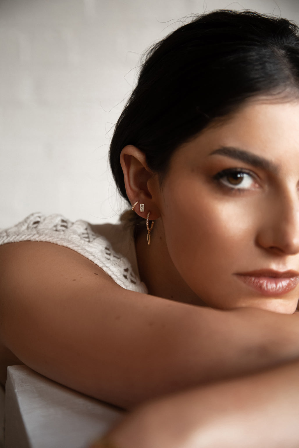 Baguette white topaz stud earrings by murkani jewellery are 18 karat gold plated