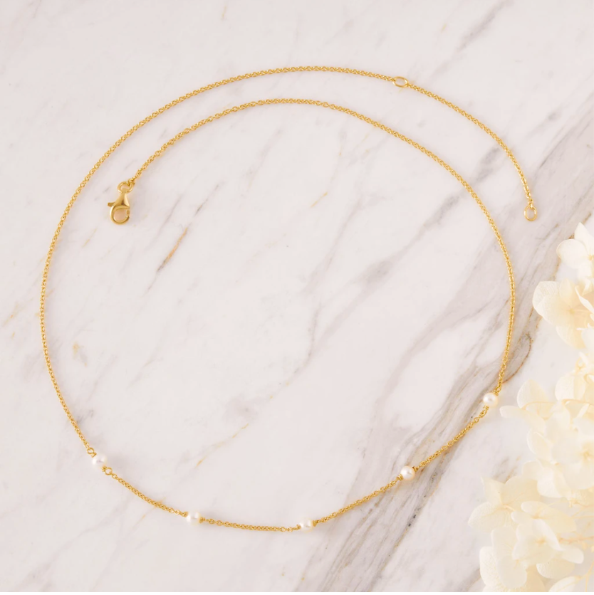 a fine gold pearl necklace by midsummer star jewellery