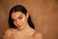 Murkani's 18 Karat yellow gold plated boho pendant disc Into The Light Necklace.