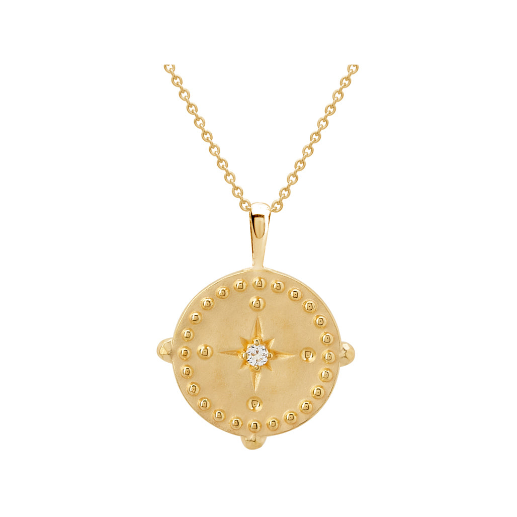 Murkani's 18 Karat yellow gold plated pendant disc Into The Light Necklace.